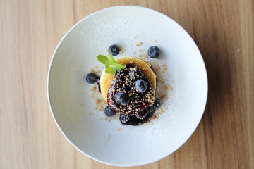 Blueberry pancake , Pancake topping with blueberries and icing dessert