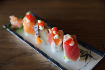 mix sushi rolls with tuna salmon shrimp sushi maki , japanese food