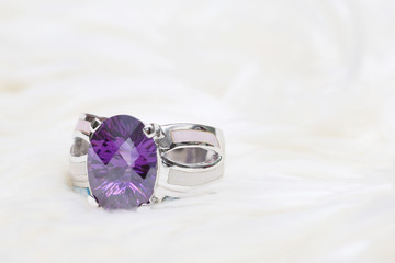 diamond ring and purple gemstone