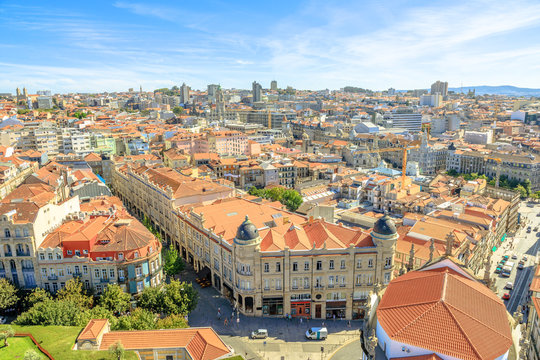 Panoramic views of historic center of Porto in Portugal from Clerigos Tower, one of the landmarks and icon of Oporto. Urban cityscape of intersection between rua da Carmelitas and rua dos Clerigos.