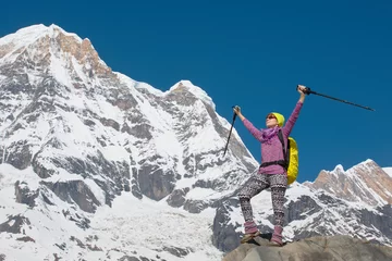 Fotobehang Girl on the background of mountain peaks   © Sergei Malkov