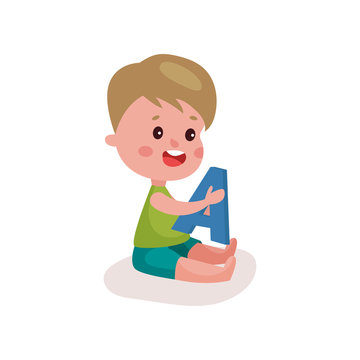 Cute little boy sitting on the floor playing with letter A, kid learning through fun and play colorful cartoon vector Illustration
