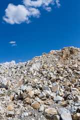 Placer of large stones in a stone quarry close-up. Mining industry.