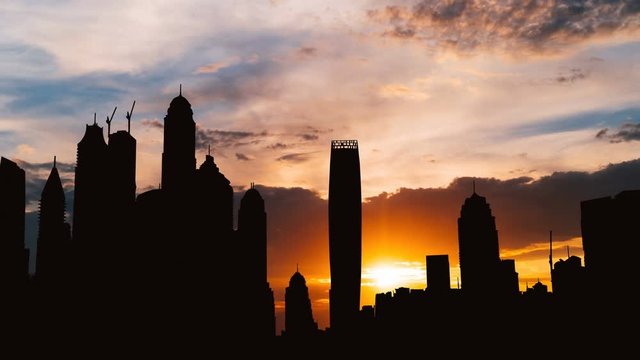 Timelapse of Dubai marina cityscape silhouette on sunset in UAE