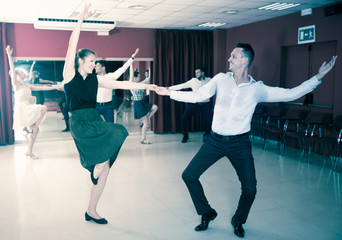 People practicing vigorous jive