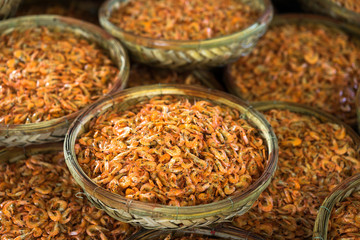 Boiled little shrimp baskets. Seafood processing at fish market in Quy Nhon, south Vietnam