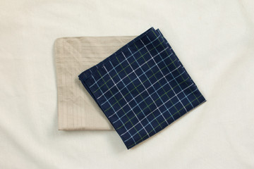 brown cloth and blue plaid