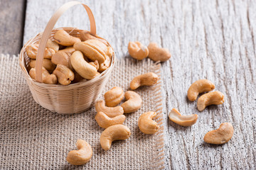 Roasted cashew nuts on rustic wood