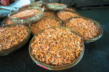 Boiled little shrimp baskets. Seafood processing at fish market in Quy Nhon, south Vietnam