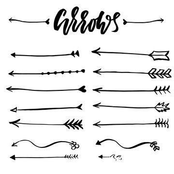Set of hand drawn vector arrows. Unique painted boho style elements. Dry brush vector illustration.
