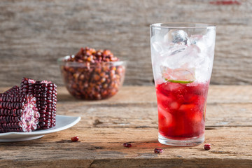 Purple corn juice wood table background