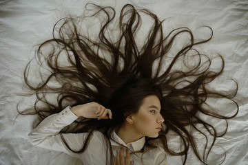 Naklejka premium young adult girl dreaming