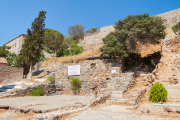 Fototapeta na wymiar Ruins of the former leper colony. Island of Spinalonga (Kalydon), Crete, Greece