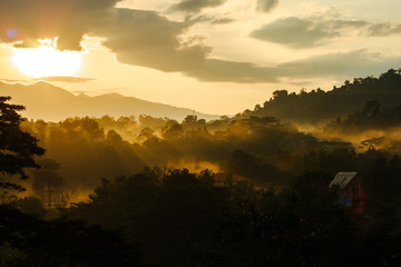 Landscape showing a beautiful scenery in the morning with light ray and misty