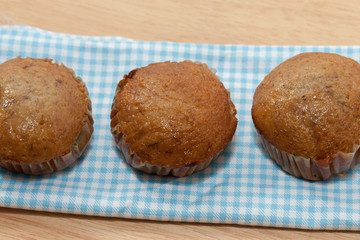 banana cupcake on wooden plate