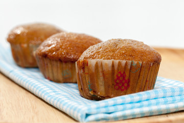 banana cupcake on wooden plate