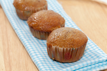 banana cupcake on wooden plate