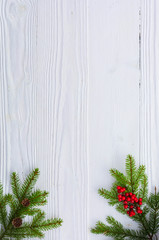 Christmas background with decorations and gift boxes on old rustic black wooden board, top view, copy space