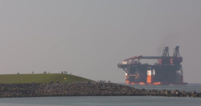 Farewell to Hermod semi-submersible crane vessel (SSCV) loaded onto the Dockwise Vanguard heavy load carrier outbound on its final route to be demolished in China.