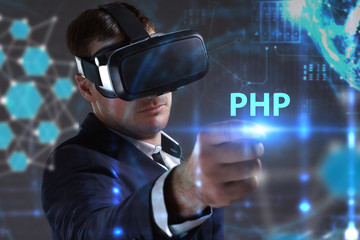 Business, Technology, Internet and network concept. Young businessman working in virtual reality glasses sees the inscription: PHP