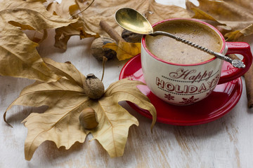 Winter mood: cup of coffee and christmas decoration