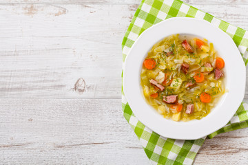 Homemade cabbage soup, cooked on smoked ribs.