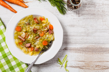 Homemade cabbage soup, cooked on smoked ribs.