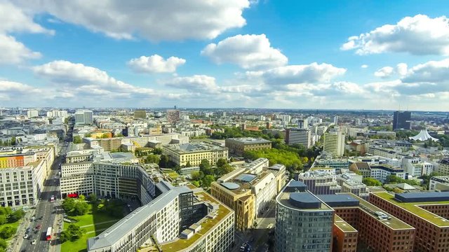 Panoramic aerial view of Berlin city, Germany. Skyline view of Berlin downtown from skyscraper on Potsdamer Platz. Time Lapse