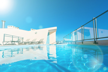 Naklejka premium Outdoor swimming pool at the House roof