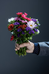 Man holding bouquet