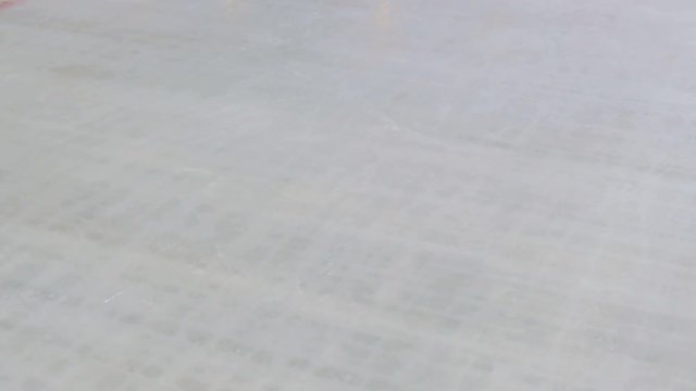 Rides backwards on skates