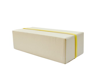 brow hard paper parcel wrapped by yellow plastic band on white background