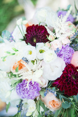 Wedding bouquet, flowers on green grass