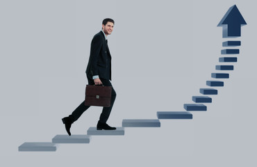 Businessman up the staircase over white background. ready for your design