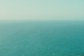 Fototapeta premium Infinite calm ocean from a birds eye view vintage color stylized