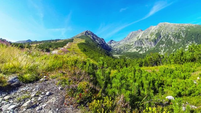 Picturesque summer view of High Tatras mountains near Strbske Pleso, Slovakia. Predne Solisko mount (2093m) in the center. Time Lapse