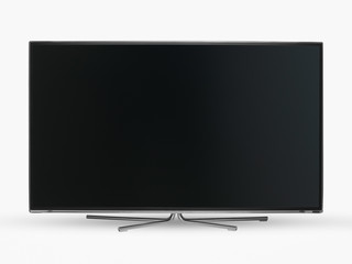 closeup of a modern widescreen LCD TV with flat screen and metal legs on white background