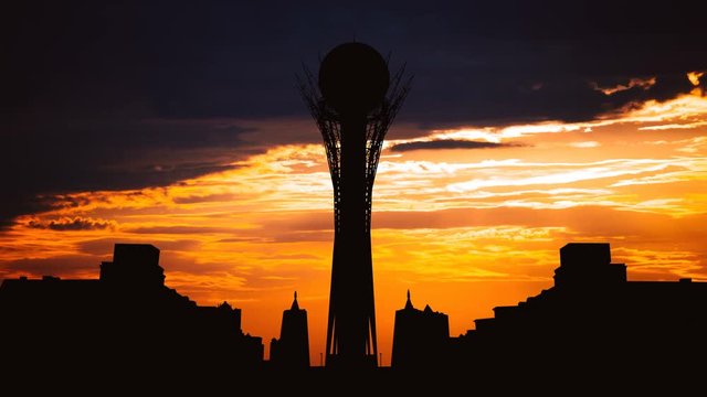 Timelapse of silhouette Bayterek tower in Astana capital of Kazakhstan on beautiful sunset