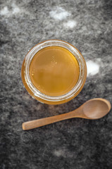 Organic Honey in a  jar on table