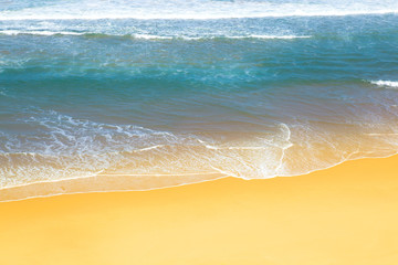 Wave of the sea on the sand beach