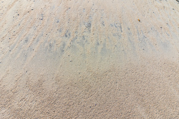 Sand in a steep hill background