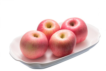 Fresh Fuji apple on white background.
