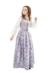 Young beautiful woman in long medieval dress isolated