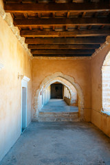 Fototapeta premium Passageway in the West Gate at the Arkadi Monastery, Arkadi, Crete, Greece
