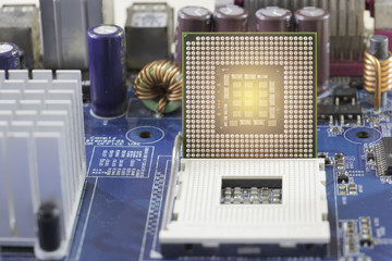 Close up of Electronic CPU on Mainboard computer.