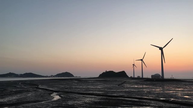 Wind turbines at sunset,Daebudo Island,South Korea.