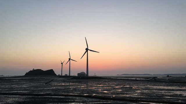 Wind turbines at sunset,Daebudo Island,South Korea.
