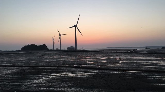 Wind turbines at sunset,Daebudo Island,South Korea.