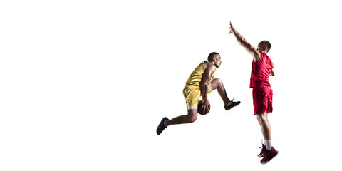Basketball players makes slam dunk. Isolated basketball players on a white background. Player fight for the ball. Players wears unbranded clothes.