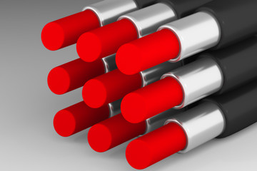 Set of red lipsticks on the light background
